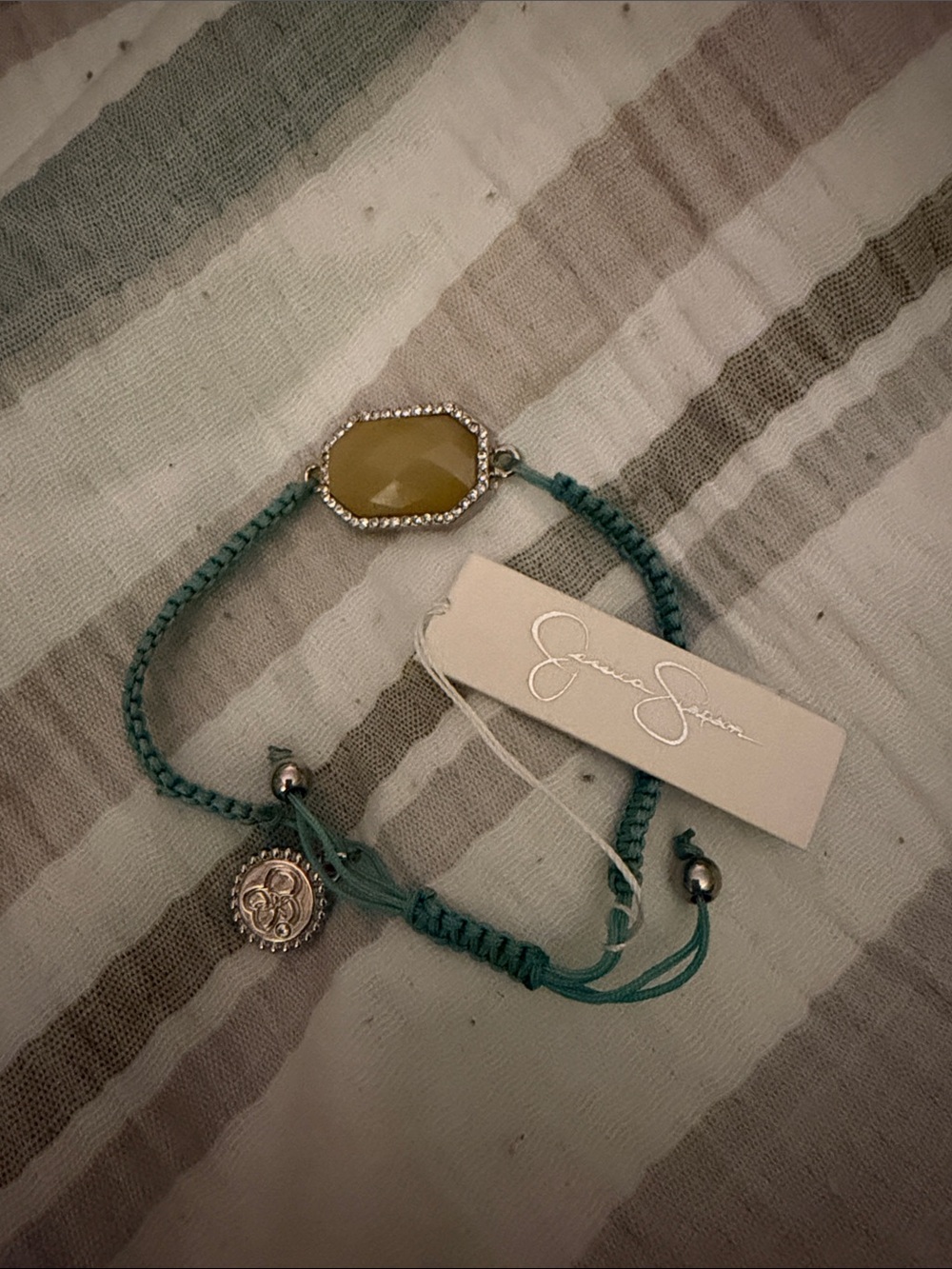 Jessica Simpson Teal Braided Bracelet with Yellow Center Stone